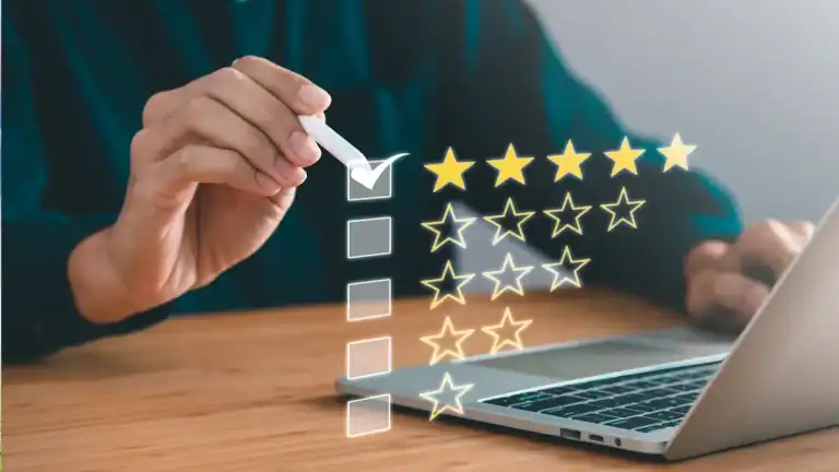 Person selecting customer satisfaction stars on digital interface.