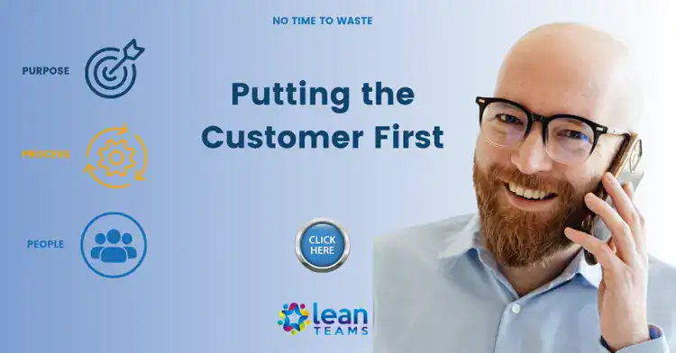 Business professional smiling on phone promoting customer-centric approach.