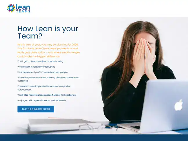 Woman covering face in front of laptop, representing stress or concern about team performance.