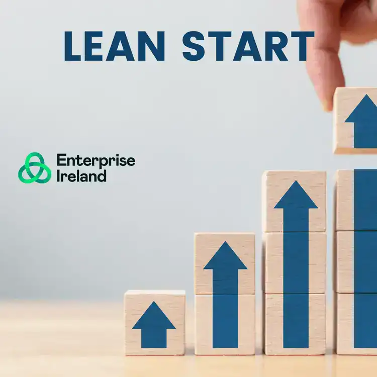 Wooden blocks with upward arrows symbolising business growth and team development.