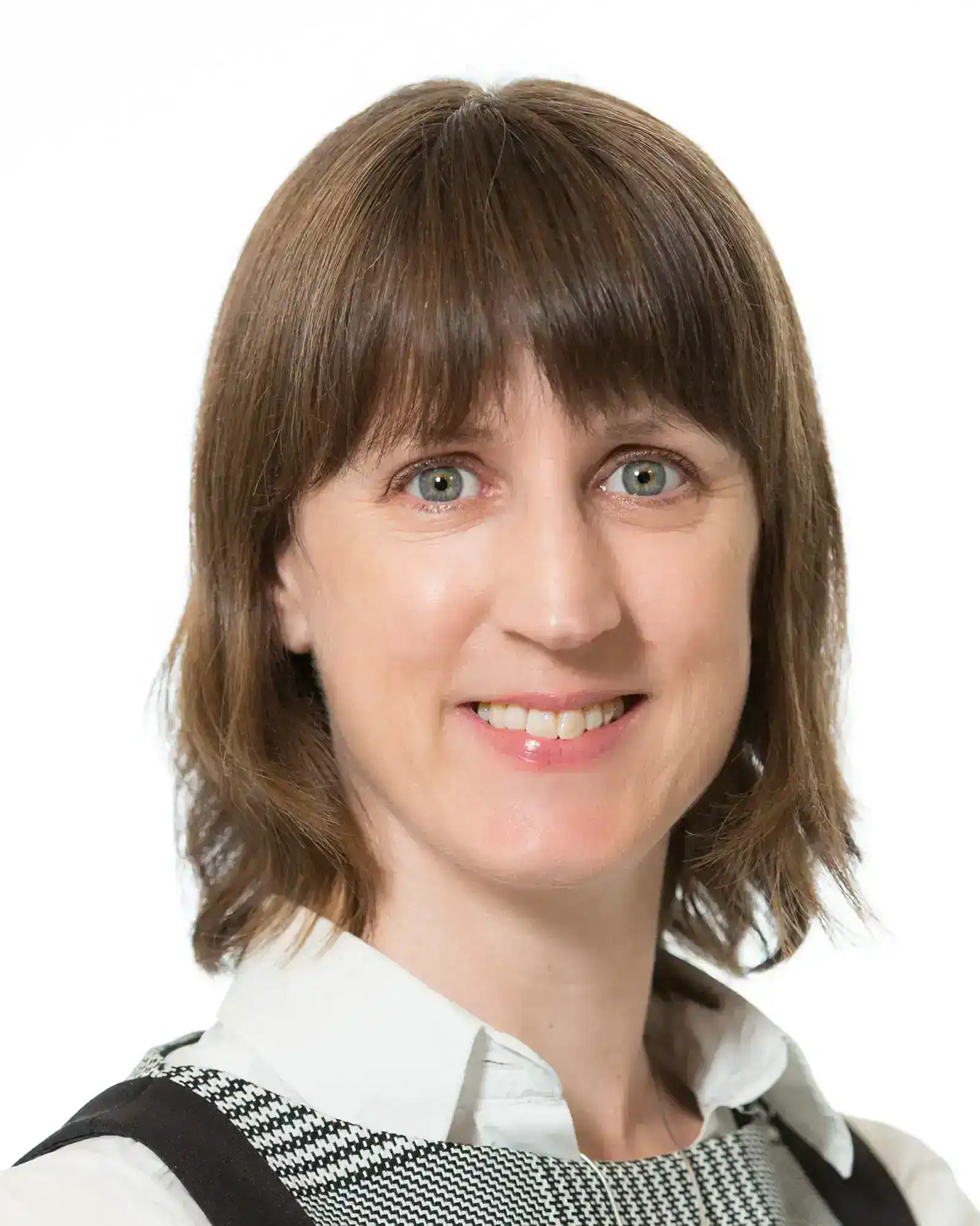 Professional woman smiling, representing business training and operational excellence in Ireland.